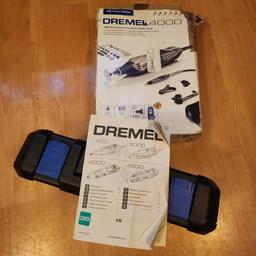 dremel 4000 comes with what's in the photos engraving adapter loads of craft materials drill bits chucks replacement bushes rencent bushes replacement