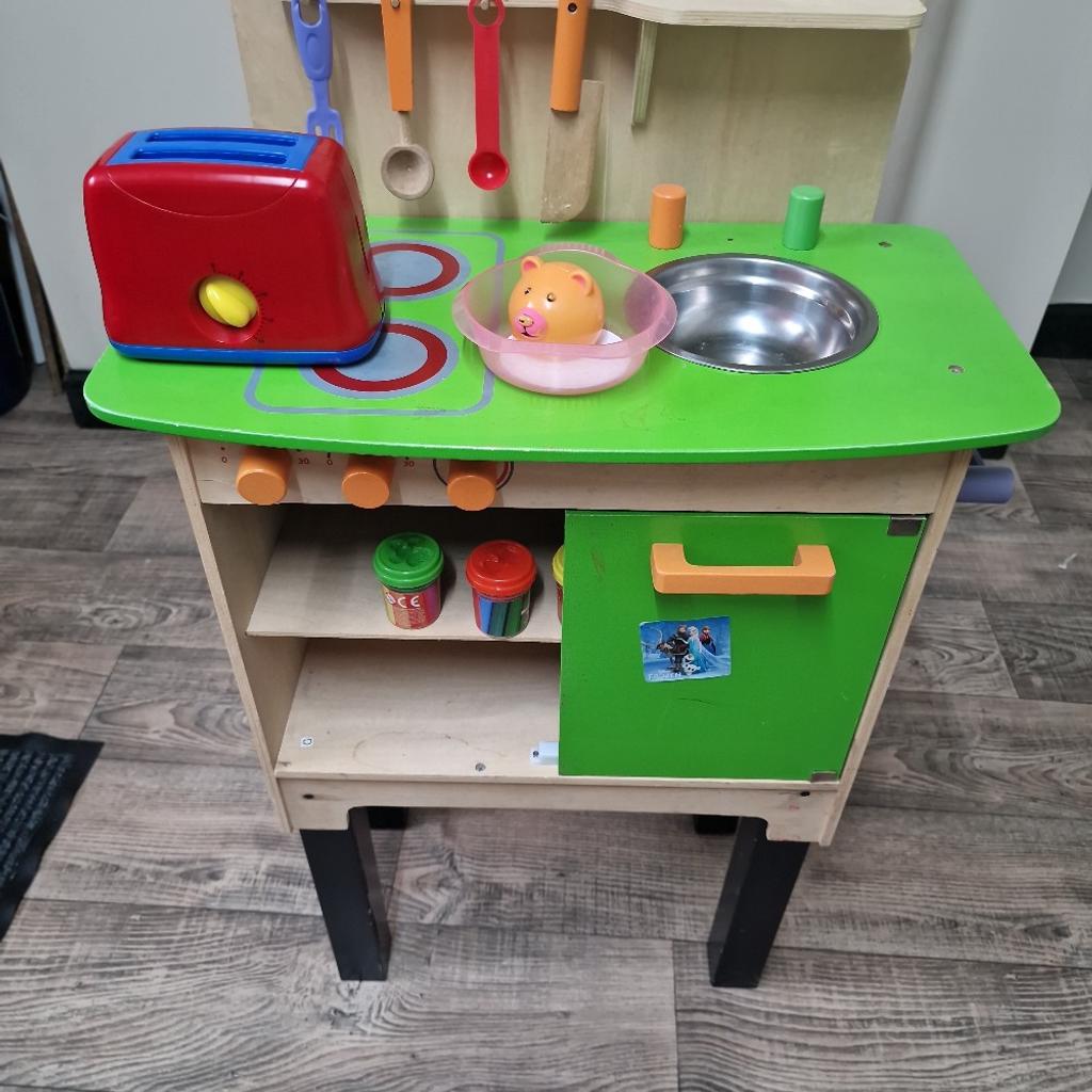 Wooden kitchen toy. Toaster not included just the spoons. One door is missing otherwise still plenty of life left in it. Ideal toy to keep little ones busy. Open to offers. Also have a lovely wooden dollhouse (see my listed items) so could buy as a bundle at discounted price. Sold as seen so No returns accepted. Thanks