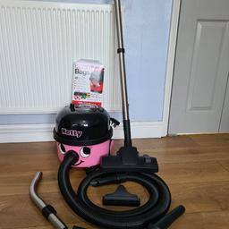 hetty vacuum used about a dozen times. perfect condition with all tools and box of new bags