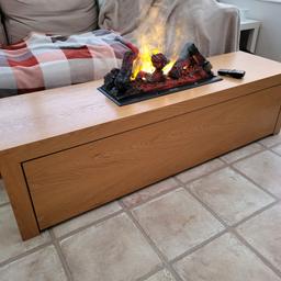 Dimplex Optimist electric fire (flame effect) housed in handmade custom oak unit with integrated storage drawers.
Length 149cm
Height 40cm
Depth 40cm