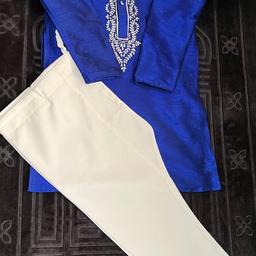 Boys royal blue sherwani suit for a 6 year old.
Comes with white bottoms.
Please note some minor stitching has come off as shown in pic. You can easily fix it, I couldn’t as I don’t have the right coloured thread.
Top has been worn once, bottom is new.
Collection preferred from E3.