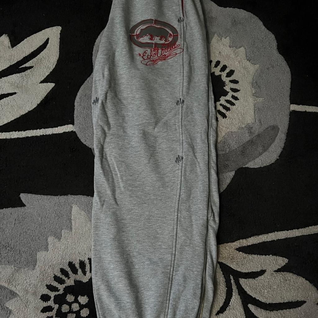 Tops are size small with tags. Super dry jumper is a size large. Ecko trousers are a size large. Never worn.