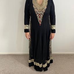 Beautiful black and gold outfit in small. No beads or diamonds missing, comes with churidar and dupatta. Worn once for a few hours.