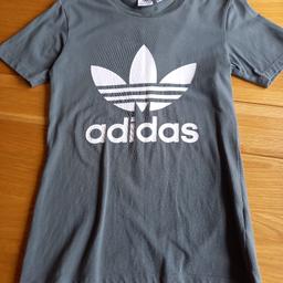 Womens grey/karki Adidas t-shirt
Large white logo on front
2XS
Brilliant condition 
Collection only