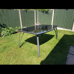 very good condition glass table with metal legs. very sturdy. Will need van for pick up, won't come apart. excellent and longlasting