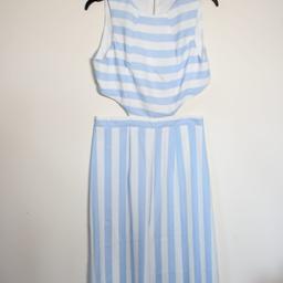 Culotte Striped Jumpsuit from Chic Me.

Sleeveless design with side cut-outs and cropped at the back. Light blue and white stripes all over and two zip fastenings at the back (one on the back of the top part, other at the back of the culottes part).
One piece lovely for the the summer, dressed up or down.

Size M, fits sizes 8-10.
Brand new without tags, never been worn, only tried on.
35% cotton, 65% polyester.

#summer #holiday #onepiece #stripes #outfit
