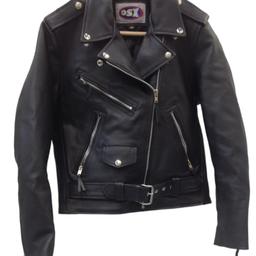 Great ladies leather biker style jacket by OSX.
New Never worn
Size - UK10

This jacket, known as the "jack knife" is made ​​of high-quality cowhide, so you can wear almost all year round (long life and durable). The lining is soft and comfortable quilted.

High-quality zippers, buttons, and other accessories are silver made ​​of metal.

The jacket has 3 external zipped pockets  along with a small press stud pocket and 2 internal pockets, one being zipped one open top

Jacket also has a leather half belt with a metal buckle. The sleeves are neatly finished with metal zips.
Genuine high-grade leather, metallic silver accessories, quilted liner.

collection and inspection welcome from DN15 or DN21
I'm happy for you to try on before you buy, etc, as this might be a small fitting UK10

willing to post if required.

please feel free to look online. These jackets are £159.99 +
so grab a bargain.