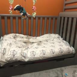 Lovely cot bed in dove grey, from cot to bed with rails and under full pull out storage draw, mattress if need it, now dismantled with all fittings