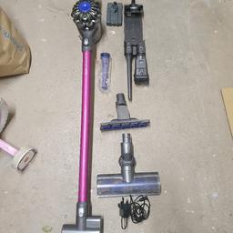 Dyson V6 Absolute Vacuum, Vacuum works but the charge isnt great, second battery available. wall mount with accessories, small powered head works OK, large power head motor doesnt work. Good item to either tate with or use as spares.