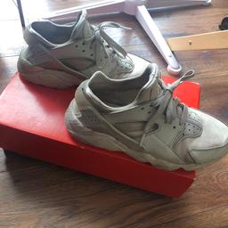 A pair of Nike Air Huaraches in Light Bone colour. UK size 5