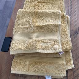 Yellow hand towels from next never used only for display excellent condition