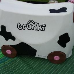 Trunki Cow Children's Ride Along Suitcase Hand Luggage Travel Holidays Camping or simply messing about at home.

Has seen some life but very durable.

COMPLETE WITH 4 WHEELS,

2 CATCHES WITH LOCKS

ADJUSTABLE STRAP & key

CARRY HANDLES
