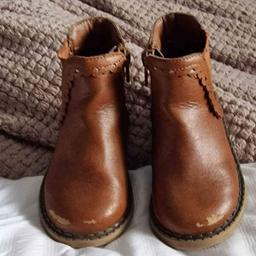 Girls tan ankle boots, infant size 5, with side zip fastening. The boots are in good condition apart from some wear on the toes, which can be covered with shoe polish, or scuff cover.