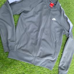 Nike zip up jacket as new worn twice 
To small on son so selling on 
Wanting £15