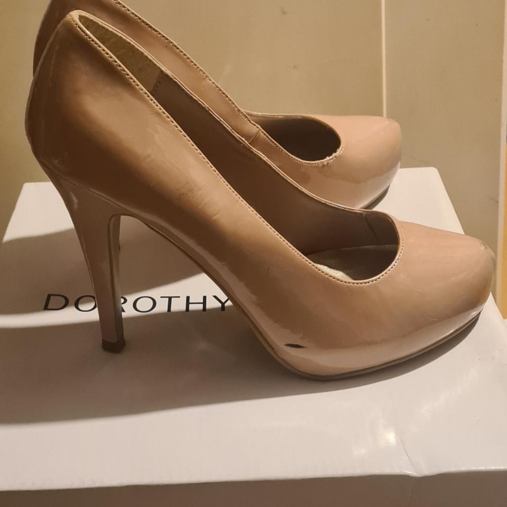Nude patent high heel platform shoes. 6" heel. Good condition. UK size 6.