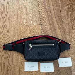 This is a black Gucci GG print crossbody bag, bought in Selfridges with original purchase receipt