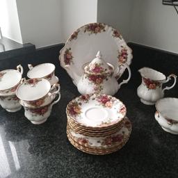 Royal Alberts Bone China Tea and Plate Set.

6 Tea Cups and Saucers
6 Side plate
Tea Pot
Sugar Bowl
Milk Bowl
Sandwich Plate

Going for 469.00 online, grab a bargain..

