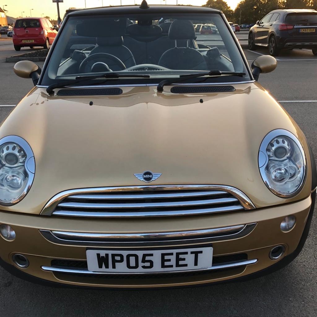 Metallic gold 2005 Convertible Mini Cooper with black roof. Petrol, manual. Glass rear window, cruise control, black leather seats, MOT till December 2023. Tax till December 2023. Partial service history. New brakes, new clutch and new exhaust and starter motor. One previous owner from new. Drives really night. Good engine. Good body work with a few scratches, one small rust patch in bonnet. Tyres treads are road worthy. Wheels need attention. Few knocks on it. Electric window and mirrors. Radio, Cd player, air conditioning needs new gas. Auto lights. 42 mph. Lumbar rest. I had for 8 years for. Driven around local journeys.
Good for costal drives on sunny days.