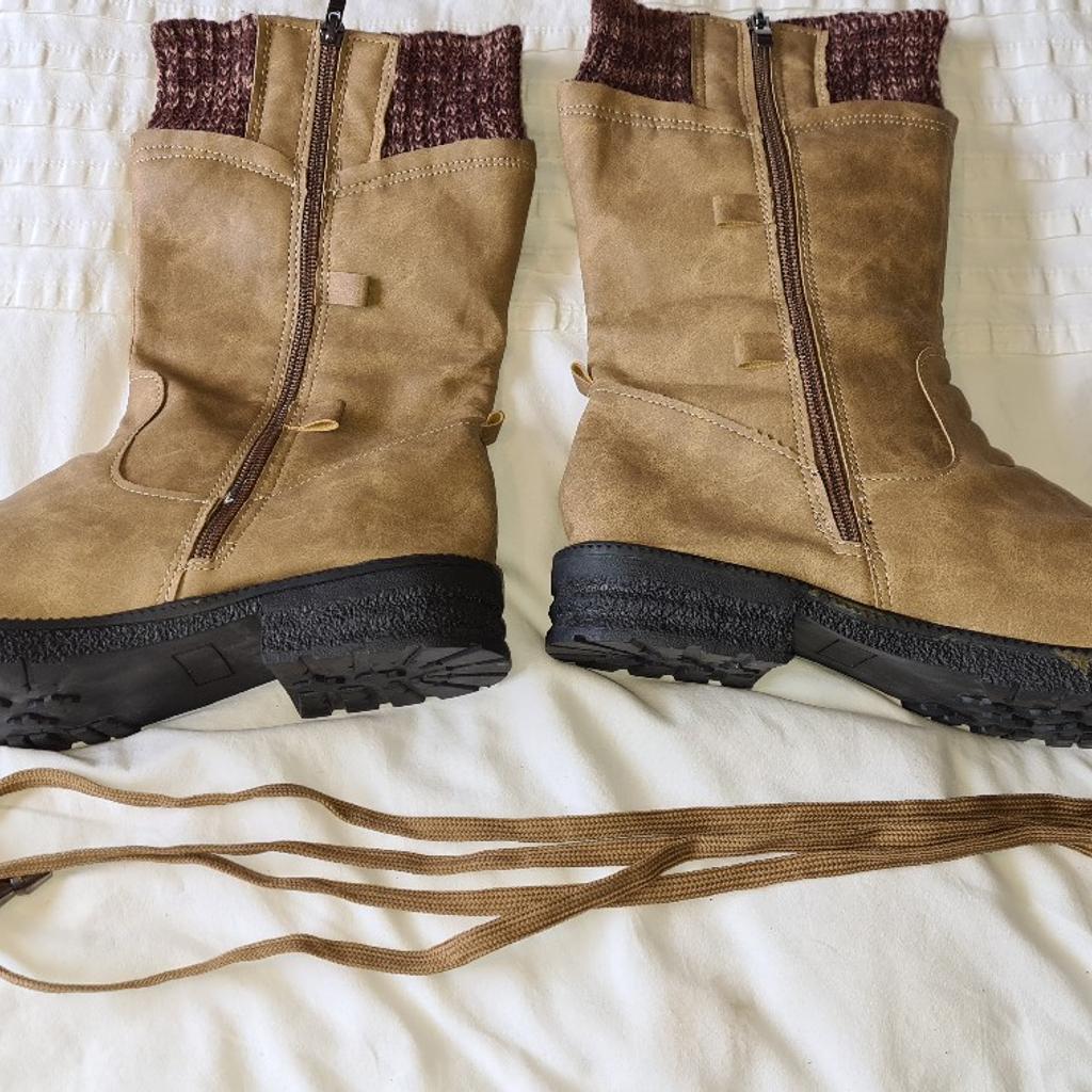Snow Boots. Brown Suede Zips And Laces. Excellent Condition Uk8. 1st 2c Will Buy. See photos for condition size flaws materials etc. I can offer try before you buy option if you are local but if viewing on an auction site viewing STRICTLY prior to end of auction.  If you bid and win it's yours. Cash on collection or post at extra cost which is £4.55 Royal Mail 2nd class. I can offer free local delivery within five miles of my postcode which is LS104NF. Listed on five other sites so it may end abruptly. Don't be disappointed. Any questions please ask and I will answer asap.
Please check out my other items. I have hundreds of items for sale including bikes, men's, womens, and children's clothes. Trainers of all brands. Boots of all brands. Sandals of all brands.
There are over 50 bikes available and I sell on multiple sites so search bikes in Middleton west Yorkshire.