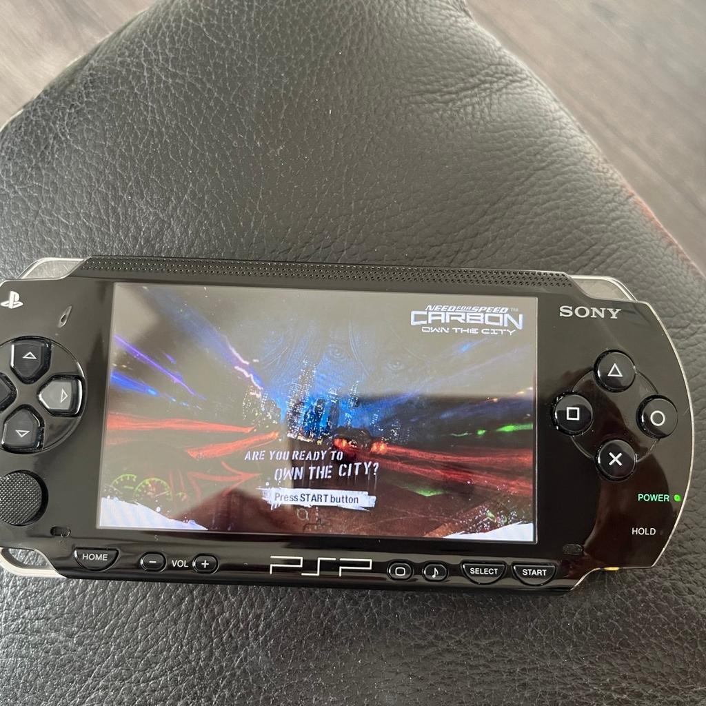 PlayStation portable psp fantastic condition has always been in a silicon cover included , 3games memory card ,tv scart connection,spare cases for taking games out with you, charging lead, storage case with shoulder strap smoke free home