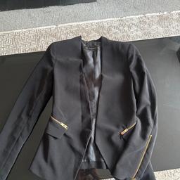 Beautiful blazer
Lovely material with gold zips
Like new