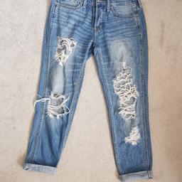 A used pair of jeans
The label says waist 26 which might be a size 8. They are stitched at the bottom so that they are turned up slightly.