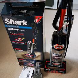 Shark DuoClean Powered Lift-Away Upright Vacuum Cleaner NV801UK. This one has the Anti Hair Wrap Floor head, "which was replaced 3 months ago' as seen in pictures, comes boxed, manual, Pet power brush, Upholstery Tool, 2 in 1 Duster Crevice Tool, great condition, £90 cash on collection. All This innovative upright vacuum cleaner combines two unique technologies for impressive cleaning performance throughout your whole home. Engineered to save you time and effort, discover DuoClean Technology. Two unique DuoClean brush-rolls work together in one vacuum head, seamlessly gliding between carpets and hard floors. How? A soft, velvet-like brush-roll replaces the front wall, pulling in debris and making direct contact with hard floors to lift stuck-on particles and fine dust. The second bristle brush gets deep into carpet pile to pull out embedded dirt. The result? A thorough clean on all floors without having to change vacuum heads.