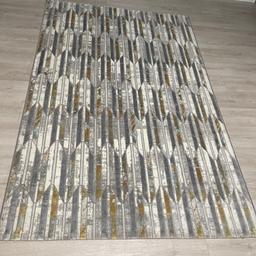 Light and dark grey patterned rug 
It’s in a very good condition like new
150x230