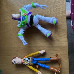Buzz and woody interactive figures they can talk to each other in great condition from smoke free pet free house