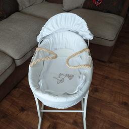Moses basket , with mattress and stand. Comes with 4 spare sheets
