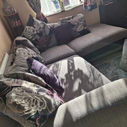 grey and purple. covers have been washed a few times so i know they come off. sofa has had more use than the chair,but still,only selling as we fancy a change. welcome to view. smoke free home.