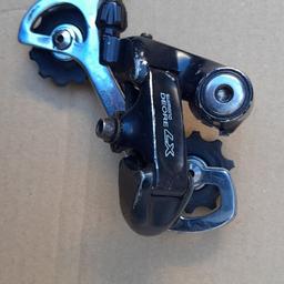 shimano deore lx derailleur works fine will need new jockey wheels which are cheap
£7 cash on collection