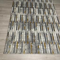Light and dark grey patterned rug
It’s in a very good condition like new
150x230