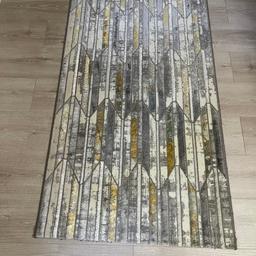 Light and dark grey patterned rug 
It’s in a very good condition like new
60x32 inches