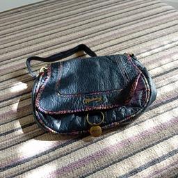 Mantaray navy across body bag hardley used in very good condition from smoke free home, with only slight curling at front from storage doesn't effect use.