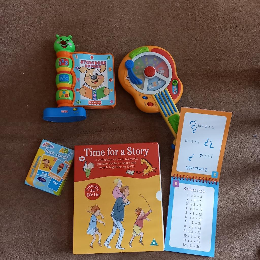 Come and grab this Toy Bundle as follows:

* Learn Times Tables Flashoad.

* Fisher Price Story Book Rhymes . This item plays tunes whilst playing nursery rhymes.

* The toys come from a smoke and pet free home.

Leapfrog Guitar. This item plays lots of musical tunes to sing along too.

Flash Cards - Great for problem Solving, Alphabet Learning and Letters and Colours.

Book a with DVD's. Ten books with DVD.

Great deal and come from a smoke and pet free home.