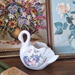 beautiful vintage ceramic swan ornament/container. ideal for dressing table. can be used for storage or flower display etc. can post.
more items listed on my page.
