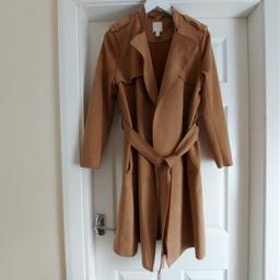 Coat “H&M“

Material Under Suede

Mustard Colour

Good Condition

Actual size: cm and m

Length: 95 cm

Length: 73 cm from armpit side

Shoulder width: 38 cm

Length sleeves: 56 cm

Volume hand: 39 cm

Volume breast: 90 cm - 98 cm

Volume waist: 97 cm – 98 cm

Volume hips: 1.08 m – 1.10 m

Length: 38 cm before to waist

Length: 15 cm from armpit side before to waist

Belt width: 5 cm

Belt length: 1.72 m

Size: 10 (UK) Eur 38, US 6

Shell: 90 % Polyester
 10 % Elastane

Pocket Lining: 80 % Polyester
 20 % Cotton

Made in China