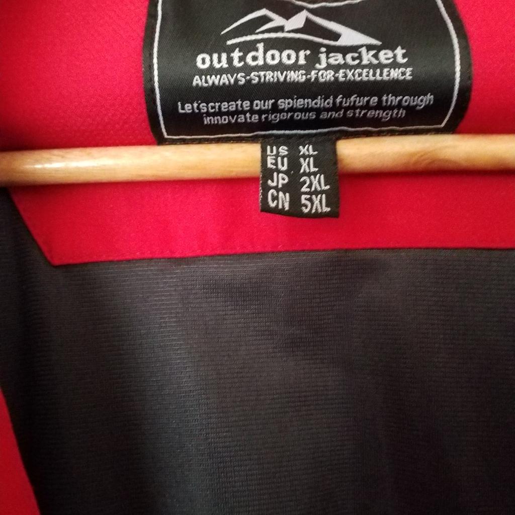 Brand new men's red hooded jacket. Slightly padded, waterproof, and windproof. Zipped and velco fastening. Absolutely brand new as I tried it on and decided it didn't suit me. It's a really nice jacket.

It is Xl American size, which equates to being a size large in the UK.

Size Large, but on the small side. I'd say it would look good on a big medium person.

No Time Wasters Please & Not Accepting Offers - £10:00

Bargain at that price as I paid £23 quid for it...

Collection from the FY2 area of Bispham. Near Ma Kelly's (Uncle Tom's Cabin

Any questions please ask, and to repeat myself , NO OFFERS JUST A TENNER!