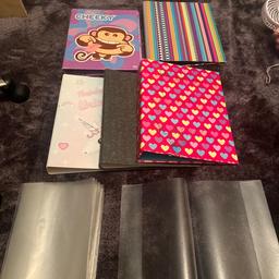 Five different designs of files with ring binders also 15 plastic backing sleeves for school books . All used but still in great condition from a clean and smoke free home..