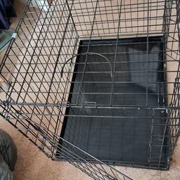 Here i have a medium/large dog cage but ideal size as not too big and bulky.It has two entrances as in photo,removeable bottom tray.In good clean condition with two carry handles on top.Dimensions as follows 35" (880mm longest) 23 1/2" (590mm width) 25 1/2" (645mm height).Thank you for looking