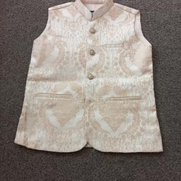 Boys asain waistcoat. Size 8 years. Been worn once for few hours. In very good condition like new. 

All offers considered