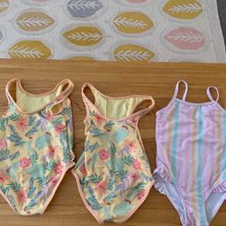 Brand new £4 bundle 3 girls swimsuits yellow size 4-5 years and stripe size 3-4 years collection only