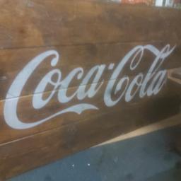 6ftx4ft coca cola table brilliant condition able to be used as a dining table or good for a man or woman cave coca cola motif straight across the middle of the table