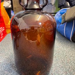 For sale brown demijohn from barker and stone house. Nice item that is in A1 condition. Used previously as flower arrangement. Change of decor only reason for sale. Collection only from smoke and pet free home.