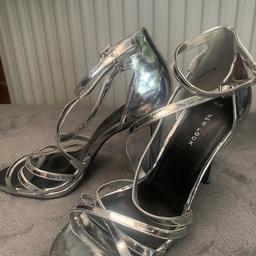 New look silver high heel strap on shoes worn once. Collection only.