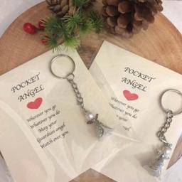 Pocket Angel
Guardian Angel key charm

This handmade keyring comes backed on a card.
With quotation :
“Wherever you go, whatever you do
May your Guardian Angel watch over you.

Stainless Steel Keyring is Standard Size
Angel Charm is approx. 3.5 x 2.5 x 2 cm in length