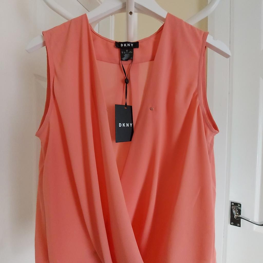 Blouse ”DKNY”

Pale Pink Colour

New With Tags

Actual size: cm and m

Length: 54 cm from shoulders front

Length: 63 cm from shoulders back

Length: 36 cm from armpit side

Shoulders width: 36 cm

Volume hand: 40 cm

Breast volume: 90 cm – 1.00 m

Volume waist: 1.02 m – 1.10 m

Volume hips: 1.05 m – 1.12 m

Size: Eur M, US M, F L

Shell: 100 % Polyester

Made in Indonesia