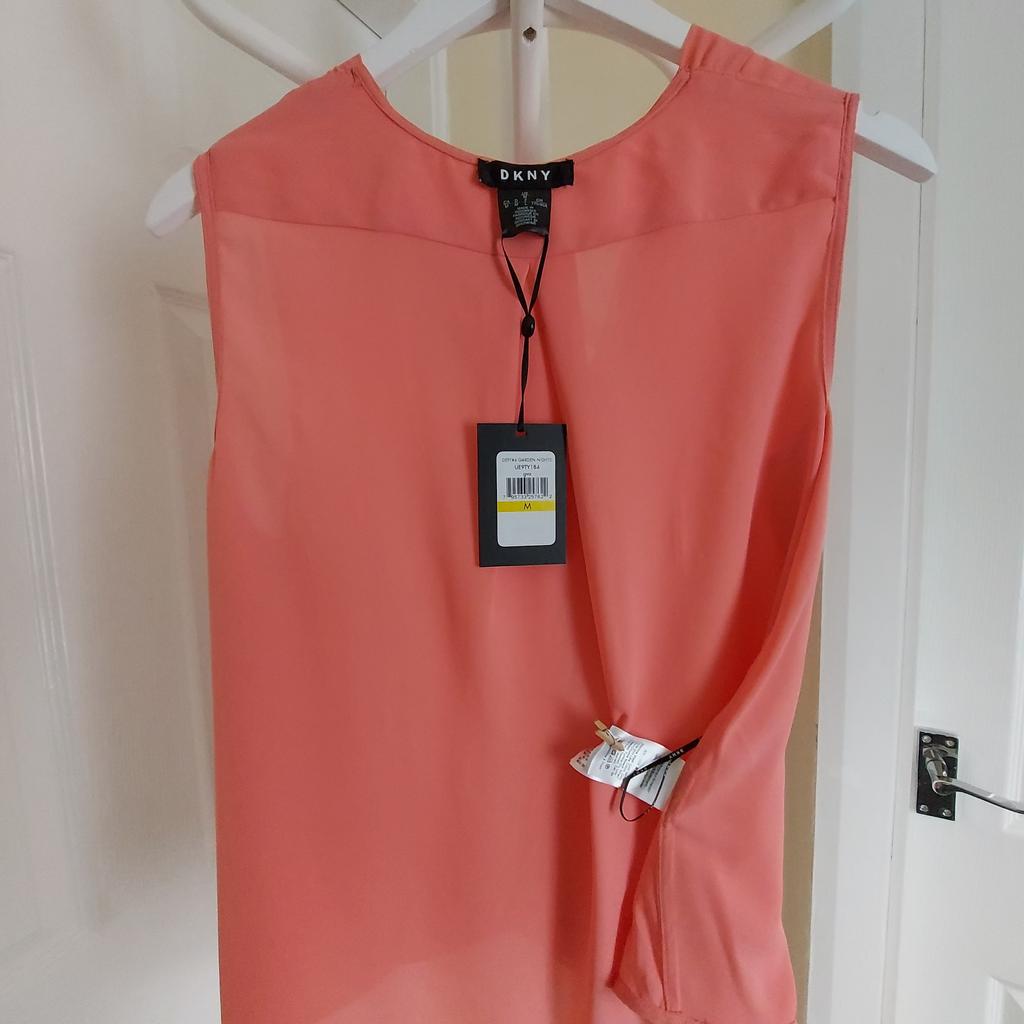 Blouse ”DKNY”

Pale Pink Colour

New With Tags

Actual size: cm and m

Length: 54 cm from shoulders front

Length: 63 cm from shoulders back

Length: 36 cm from armpit side

Shoulders width: 36 cm

Volume hand: 40 cm

Breast volume: 90 cm – 1.00 m

Volume waist: 1.02 m – 1.10 m

Volume hips: 1.05 m – 1.12 m

Size: Eur M, US M, F L

Shell: 100 % Polyester

Made in Indonesia