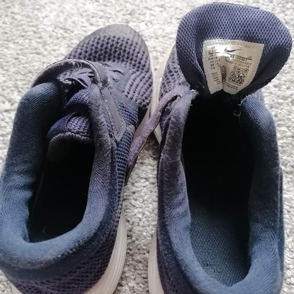 Navy blue Nike trainers, good condition, size UK2 (EU34). From a smoke and pet free home